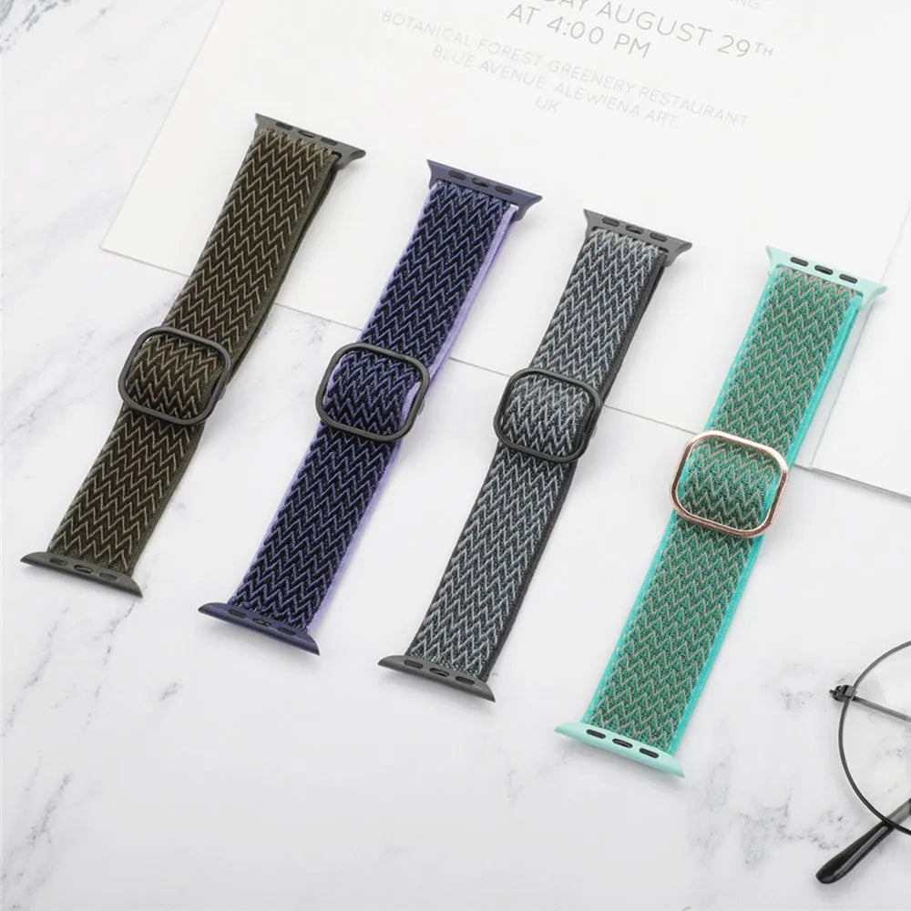Braided nylon elastic Apple Watch strap in wave pattern, shown in Lilac colour on a wrist.