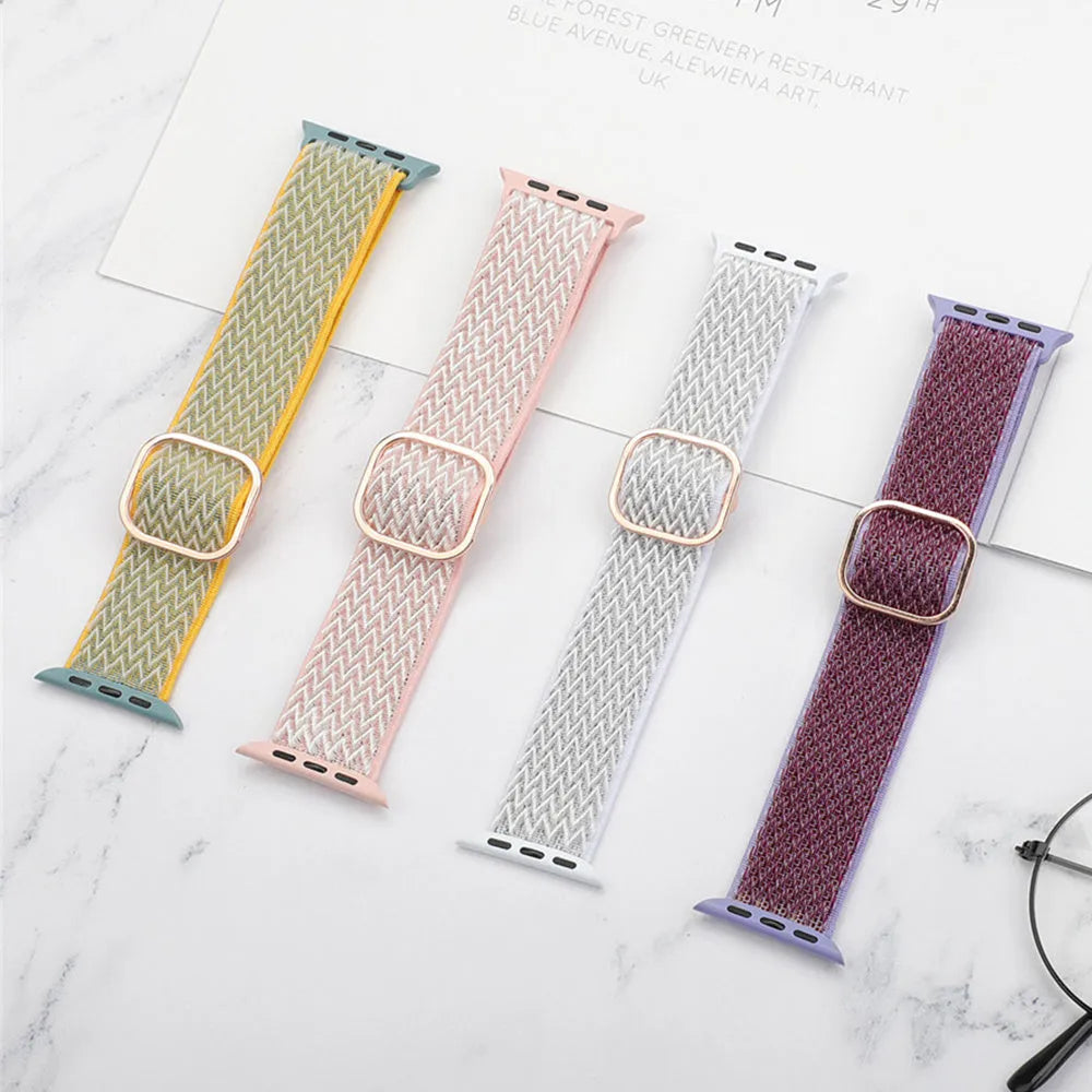 Braided nylon elastic Apple Watch strap in wave pattern, shown in Lilac colour on a wrist.