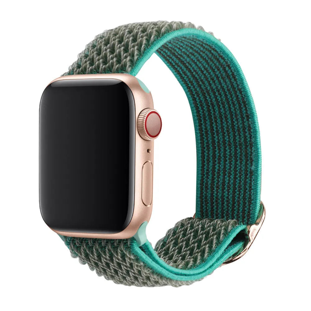 Braided nylon elastic Apple Watch strap in wave pattern, shown in Lilac colour on a wrist.