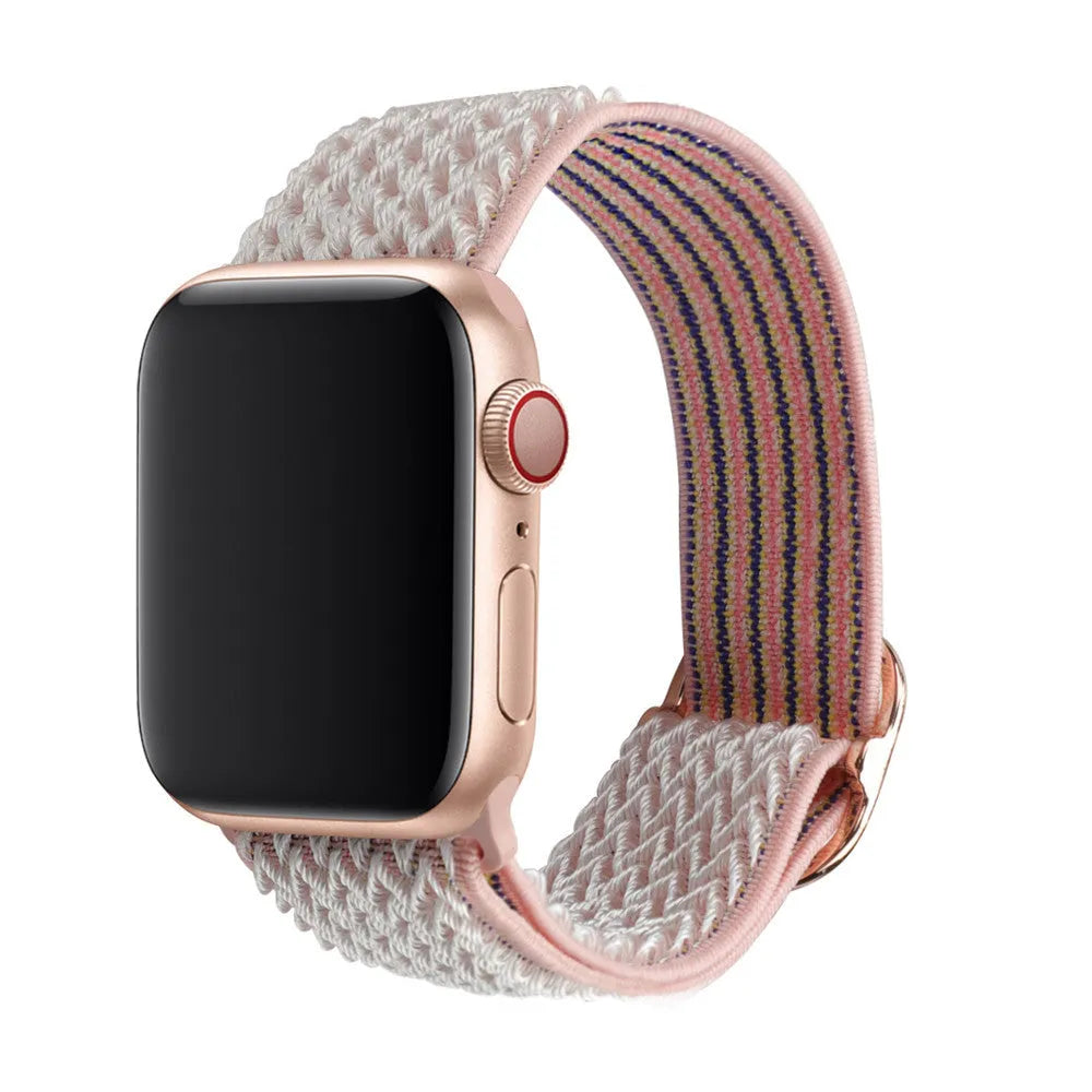 Braided nylon elastic Apple Watch strap in wave pattern, shown in Lilac colour on a wrist.