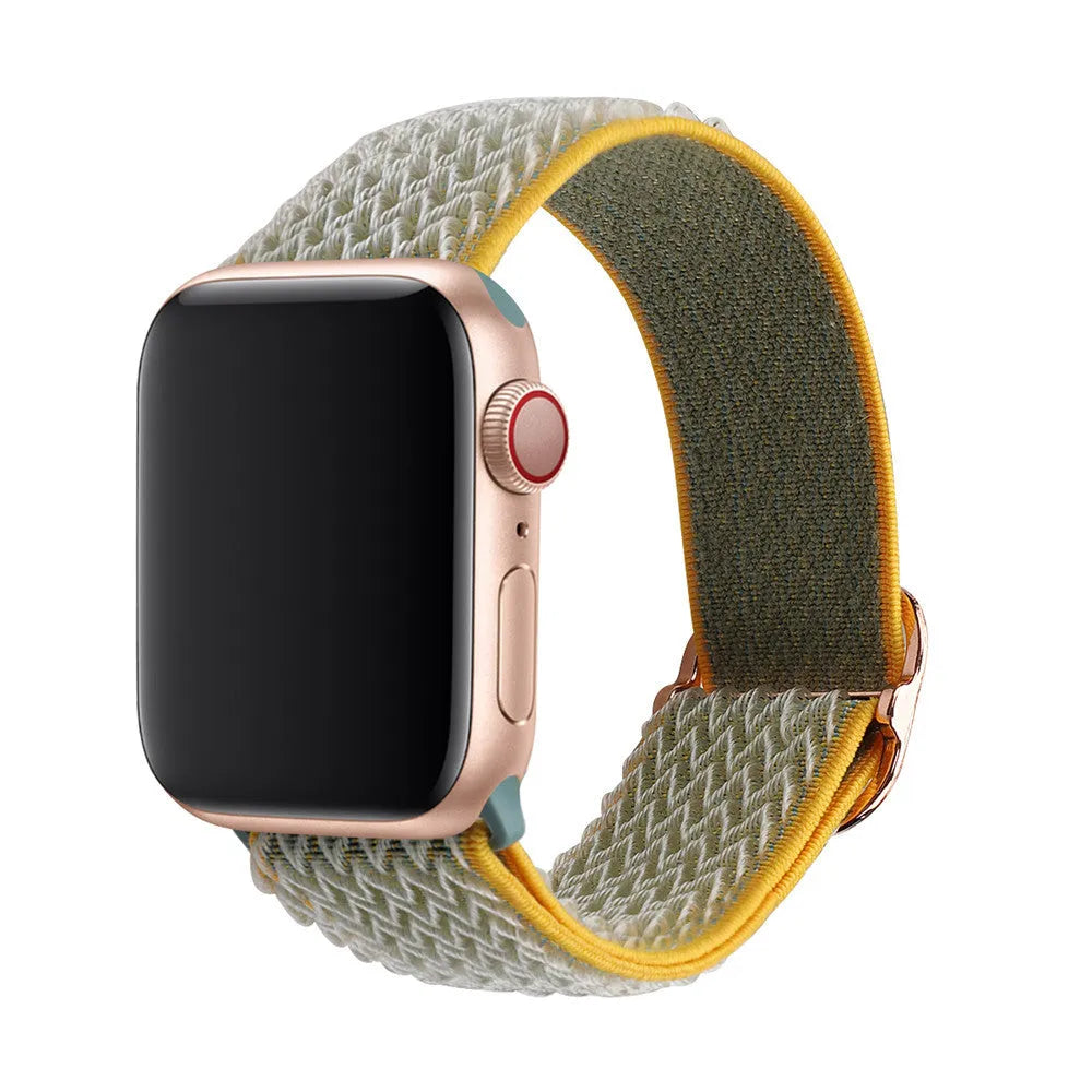 Braided nylon elastic Apple Watch strap in wave pattern, shown in Lilac colour on a wrist.