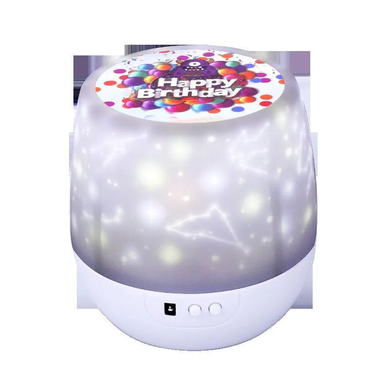 Cartoon-style starry sky projector lamp projecting galaxy patterns on a wall.
