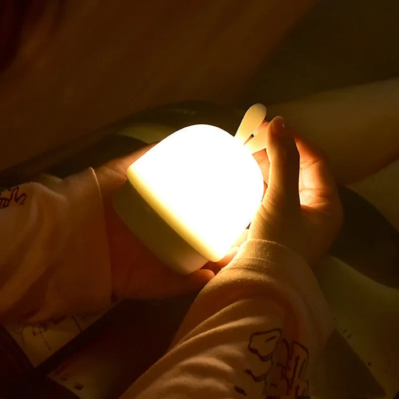 Silicone LED pat light in small rabbit or dumpling style with warm white light, pink blue or white colour