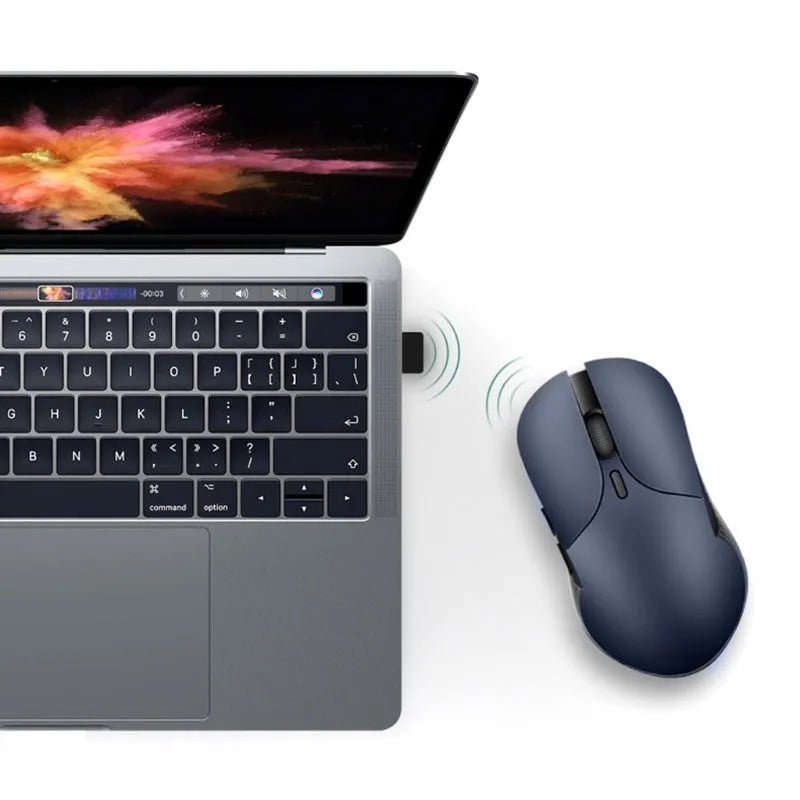 Blue Smart Voice Mouse 2.4G wireless with voice control button on a desk.
