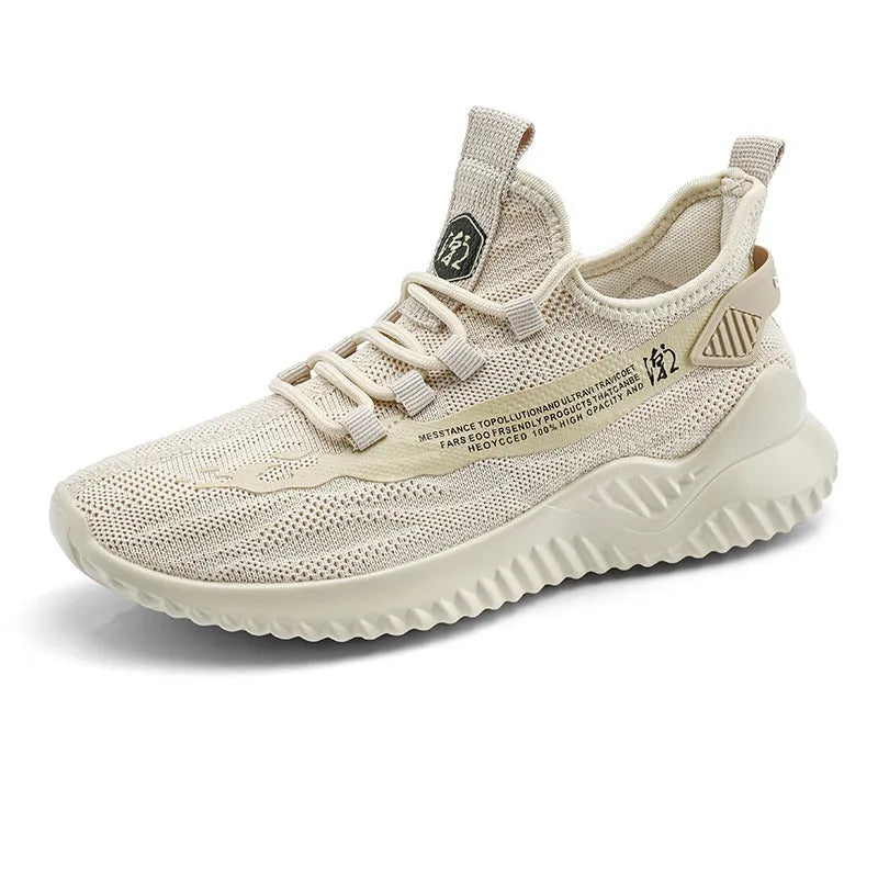 Men's low-top white mesh sports shoes with rubber sole and front lacing on a plain background
