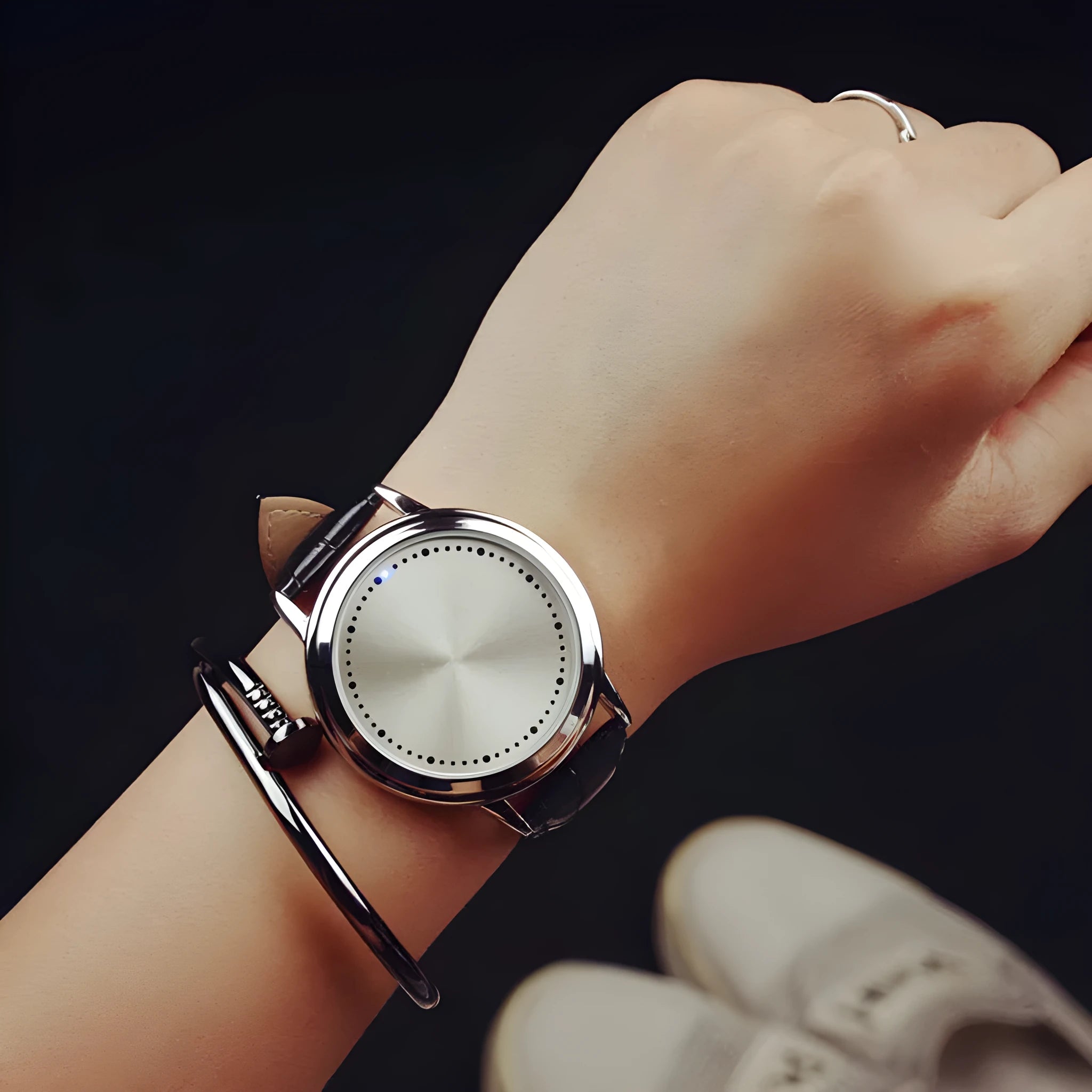 Electronic casual watch with digital display and blue light feature in black or white colour