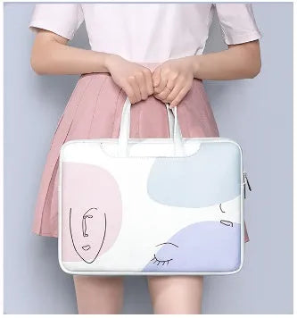 Blue PU leather laptop bag for girls with a soft handle and zipper opening.
