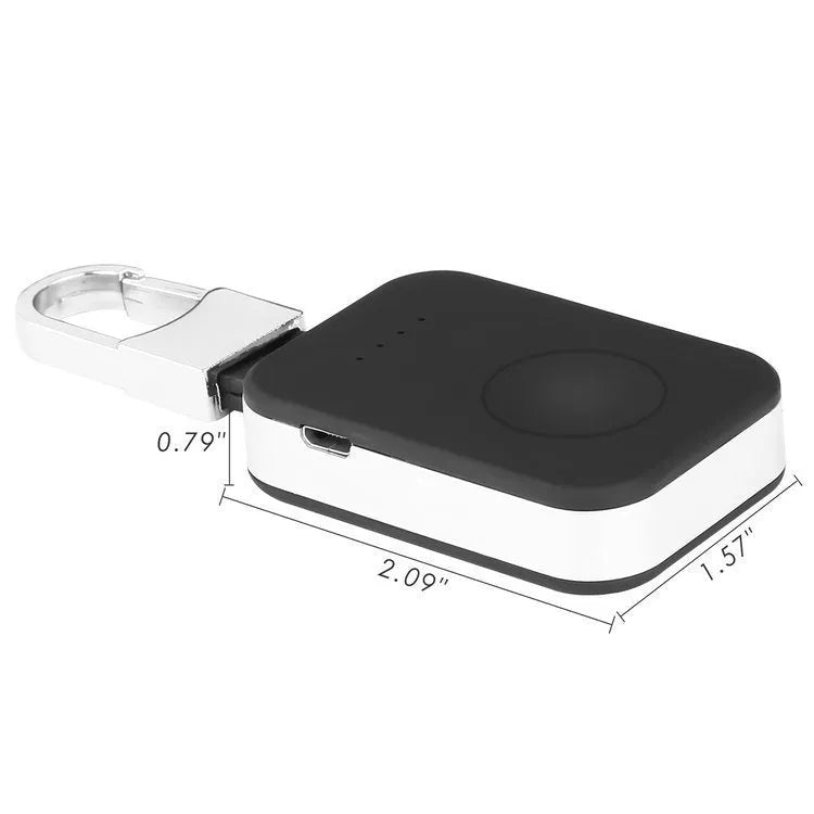 Black Apple Watch portable wireless power bank on a keyring showing compact size.