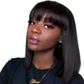 Black human hair wig with 10-inch medium length on a mannequin head