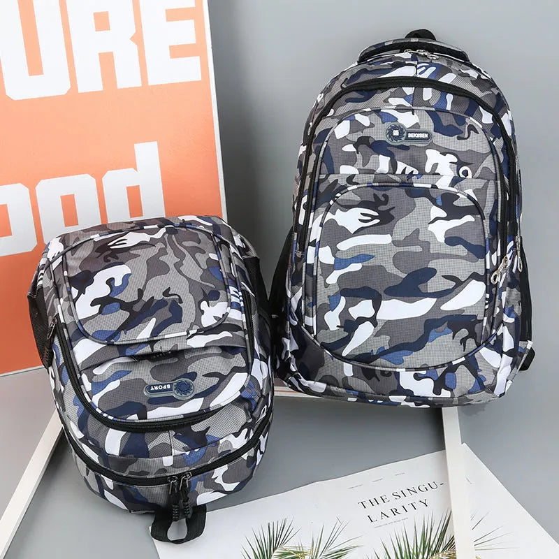 Blue Oxford fabric school backpack with padded black shoulder straps and side pockets.