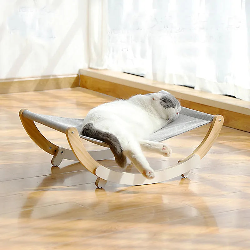 Solid wood cat shaker pet nest with off-ground design, anti-slip mat, and grey or blue cloth cushion, 56.5x30cm
