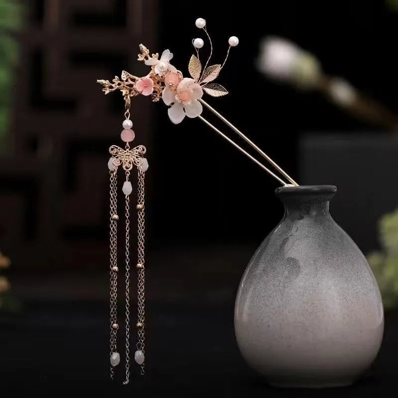 Performance Girl pink acrylic antique eyebrow hairpin set on a natural background