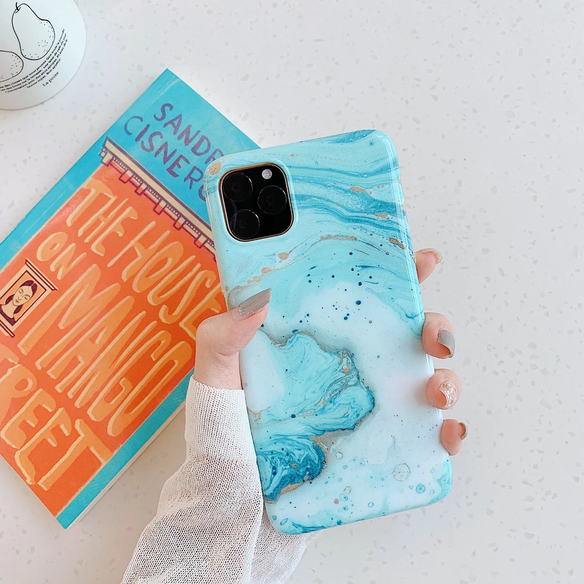 Frosty marble silicone phone case back cover with geometric pattern for iPhone models, available in multiple colours