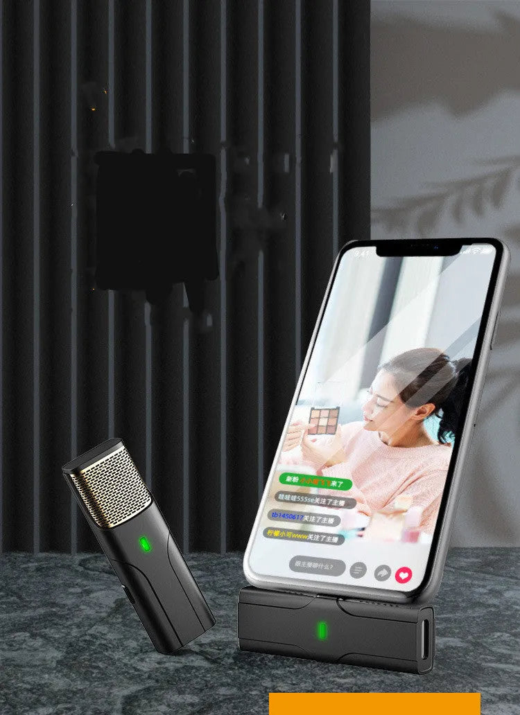 Black wireless lavalier microphone with compact plastic and metal housing for mobile recording