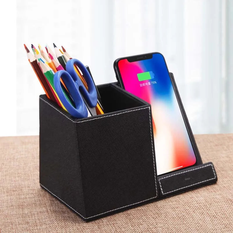 Black leather pen holder wireless charging station for desk organisation with phone charging surface