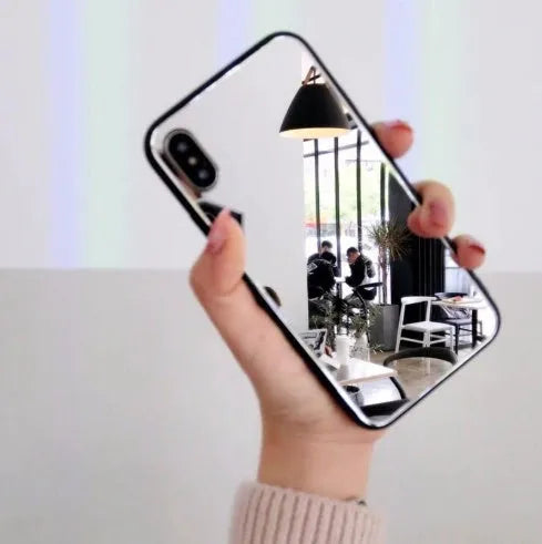Black iPhone back cover case with a built-in square mirror on the back.