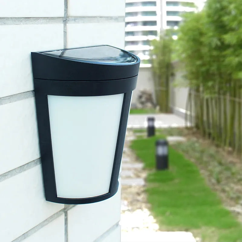 Solar-powered outdoor wall lamp with 6 LEDs for garden and pathway lighting