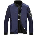 Men's reversible flight jacket in black colour with stripe pattern, shown with zipper closure and casual fit