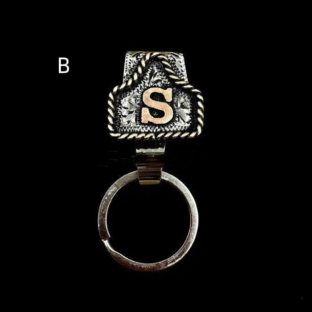 Handmade metal cow tag belt key holder in various colours for key organisation