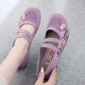 Women's slip-on flat shoes in embroidered purple with elastic fabric upper and rubber sole