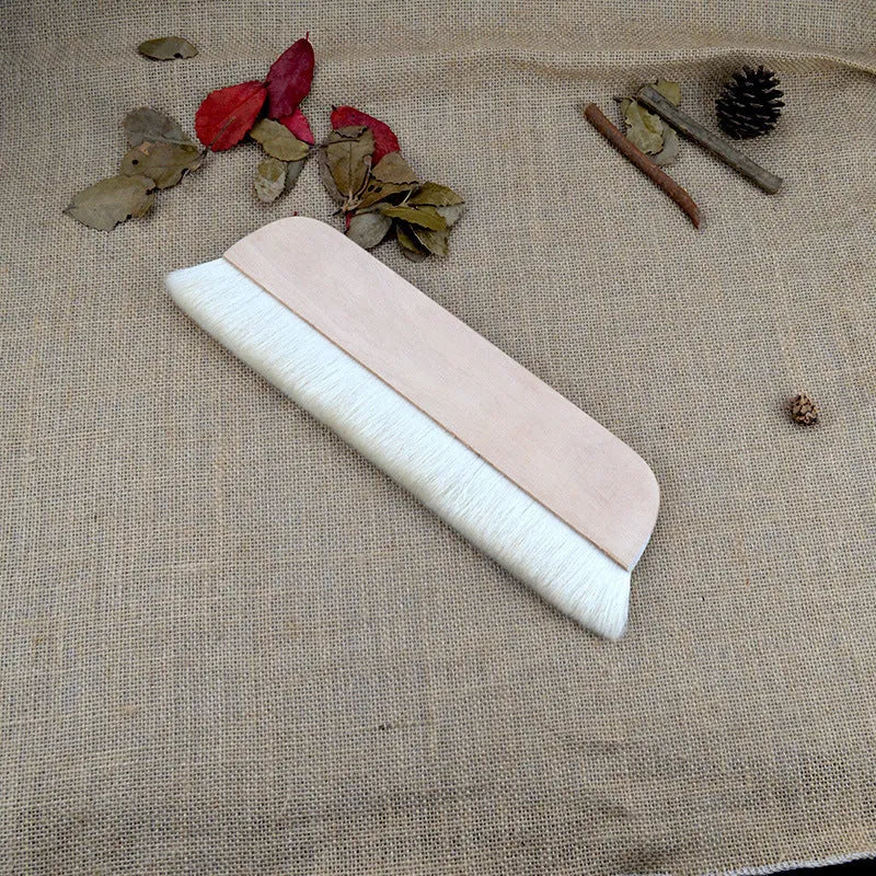 Wool brush for mounting paste application on artwork boards