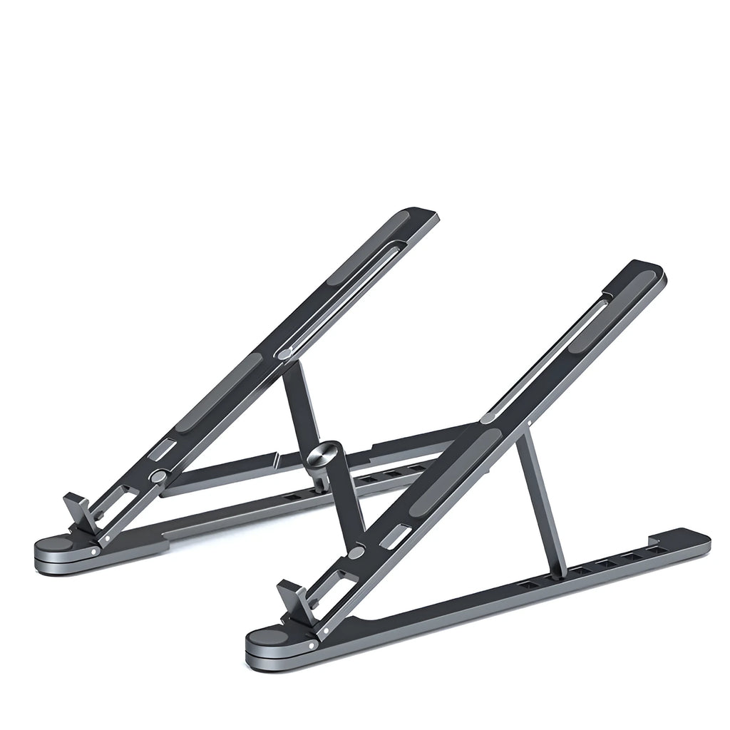 Silver aluminium folding laptop stand adjusted to medium height with a laptop in place.