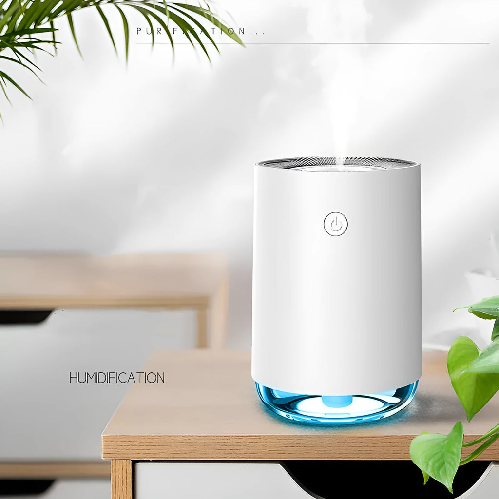 Green USB rechargeable night light humidifier diffuser on table with charging cable