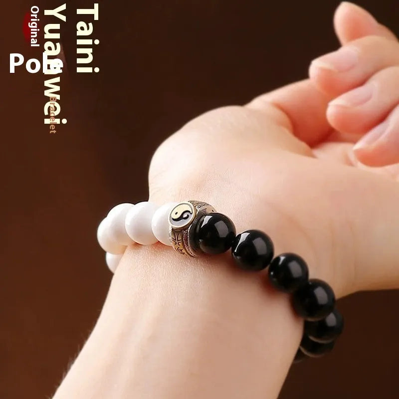 Geometric black and white obsidian Tai Chi bracelet with woven six-word mantra pattern