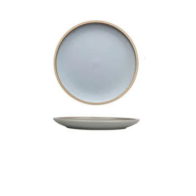 10-inch pure blue matte finish ceramic dinner plate on a table.