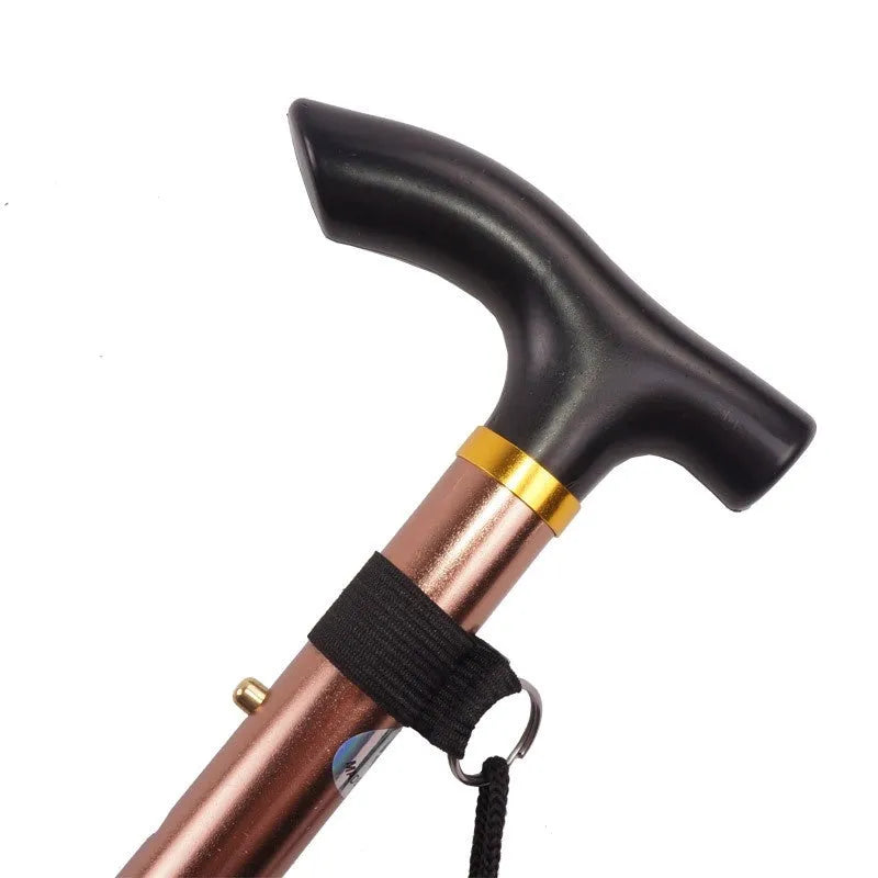 Adjustable aluminium folding walking cane extended, showing anti-slip handle and rubber tip.