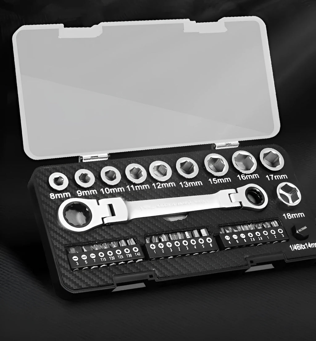 Ratchet wrench set with sockets and bit heads on grey background