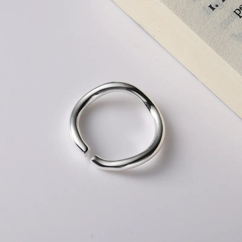 Women's 925 sterling silver irregular twisted wave line ring in plain silver with adjustable opening