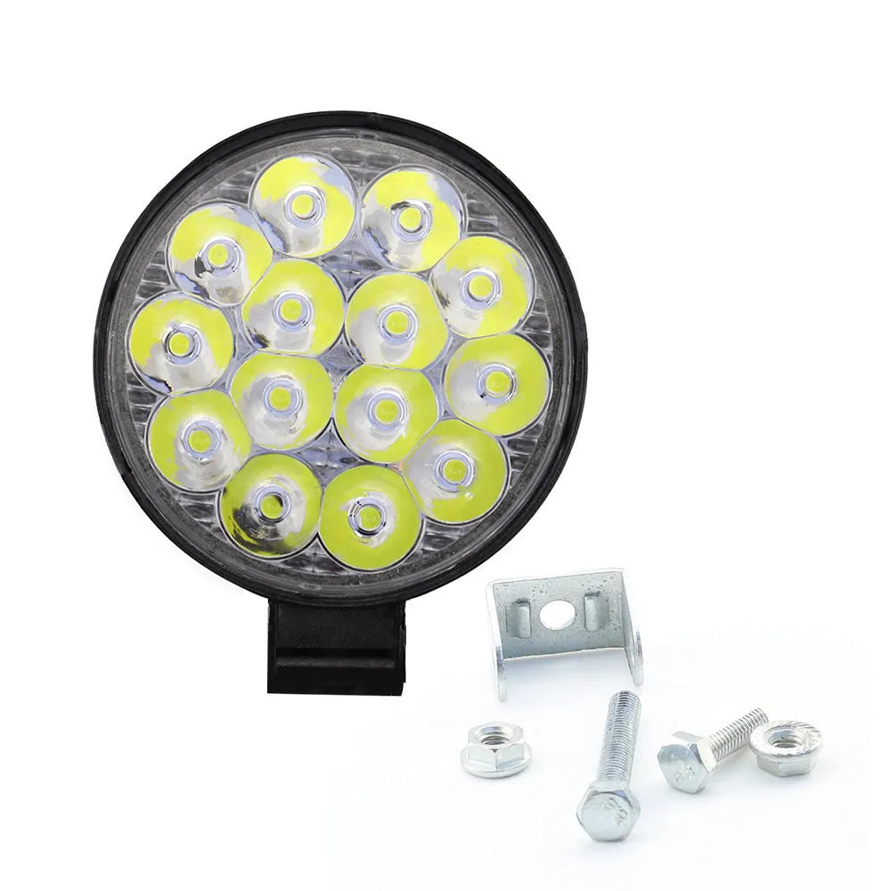 Compact round aluminium car LED work light with IP67 waterproof rating and 6000K white light output.