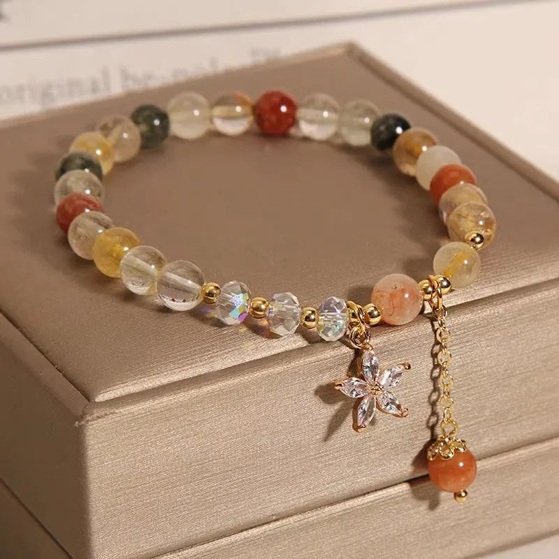 Coloured hair crystal bracelet with single circle design and chosen charm: cat's paw, purse, flower, or zircon butterfly