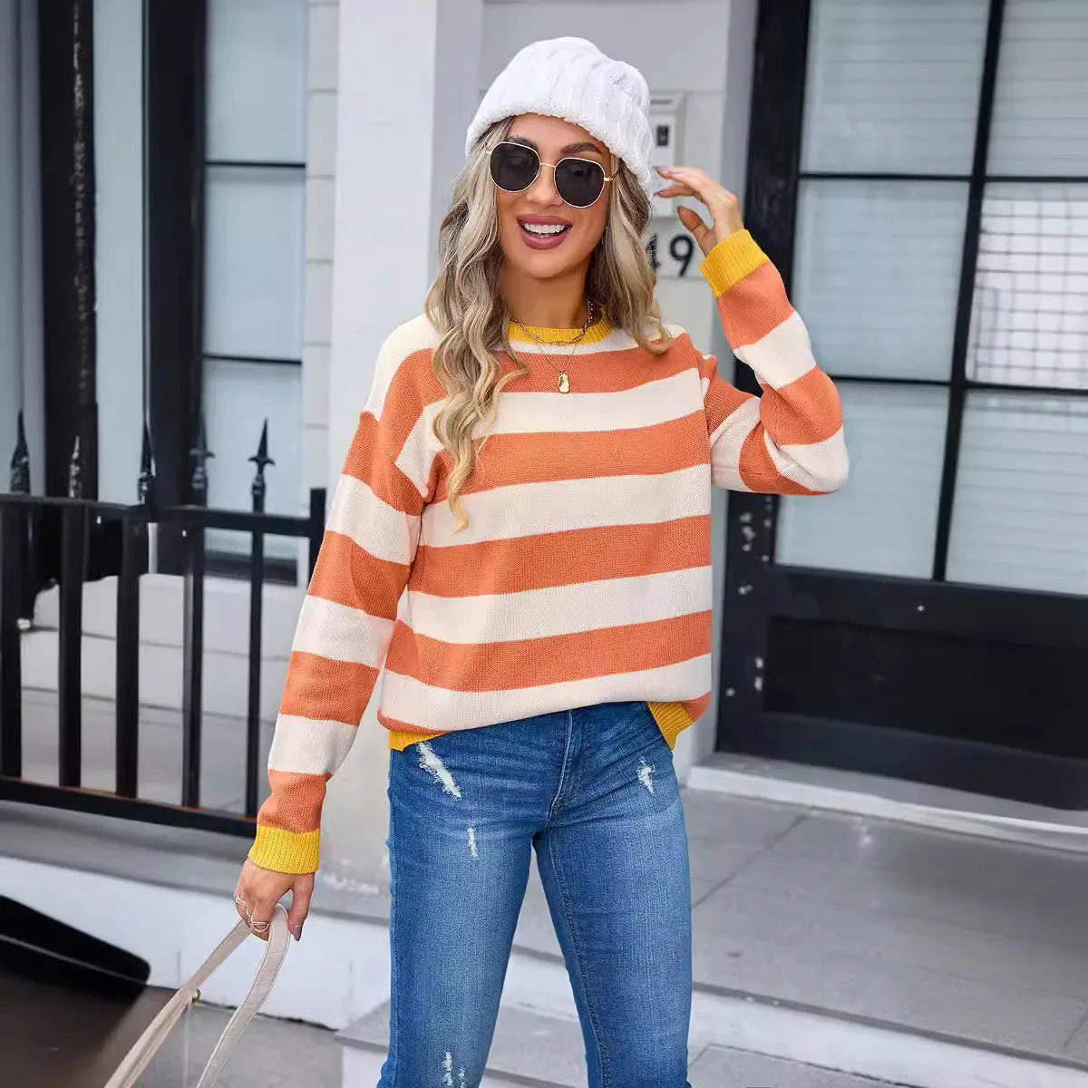 Women's loose fit long sleeve acrylic sweater in blue with floral stripe pattern