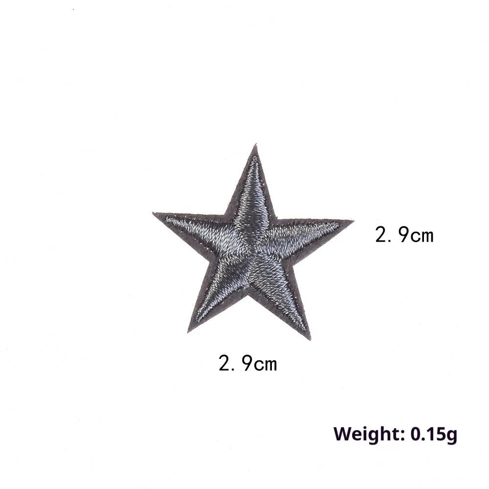 Colourful five-pointed star cloth embroidery stickers for DIY clothing decoration on a fabric background.