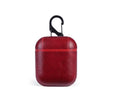 Leather protective case for Apple Airpods charging case in black, brown, light brown, and red colours