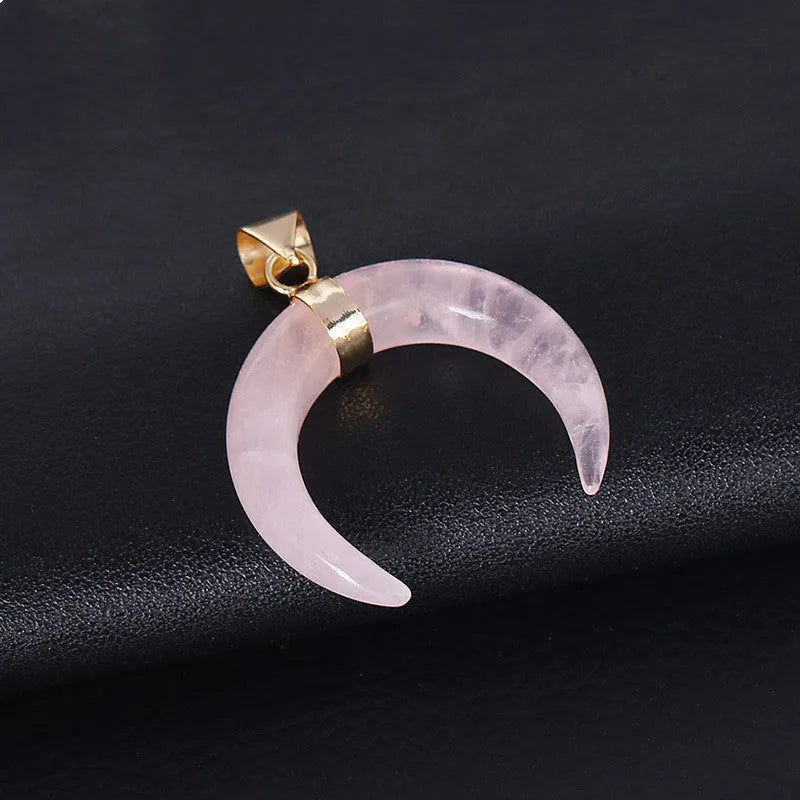 Natural stone moon pendant necklace with electroplated copper chain, shown in pink and purple colour options.