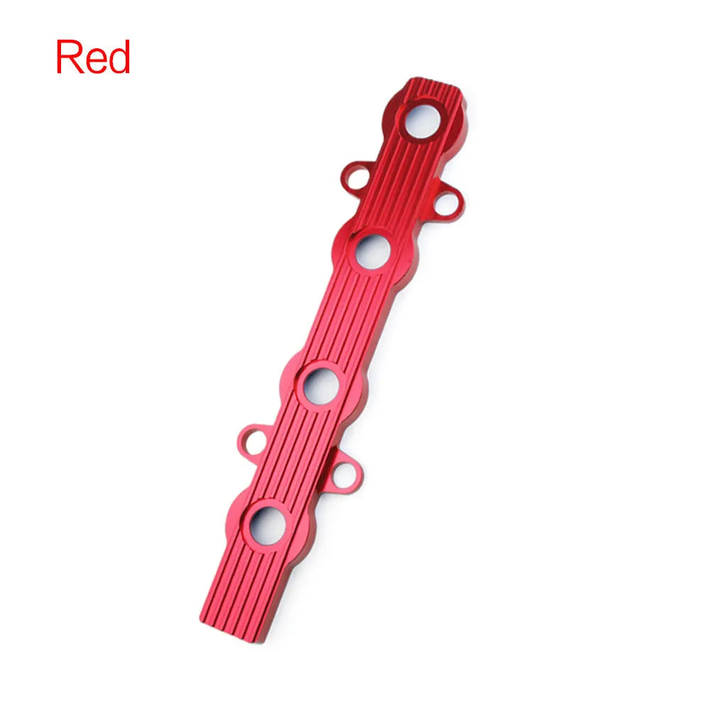 Aluminium alloy engine cover in red, available with or without ventilation holes.