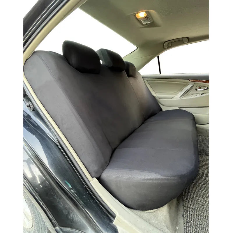 Universal polyester eyelet fabric car seat cover set in chosen colour on a car seat.