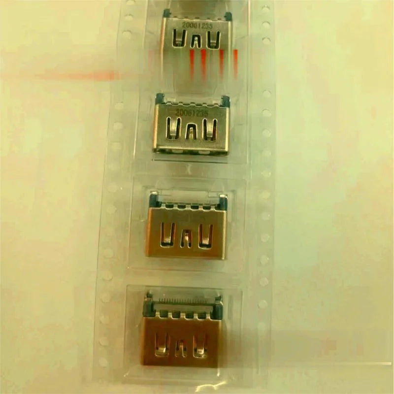 Silver coloured HDMI host socket interface for gaming console accessory.