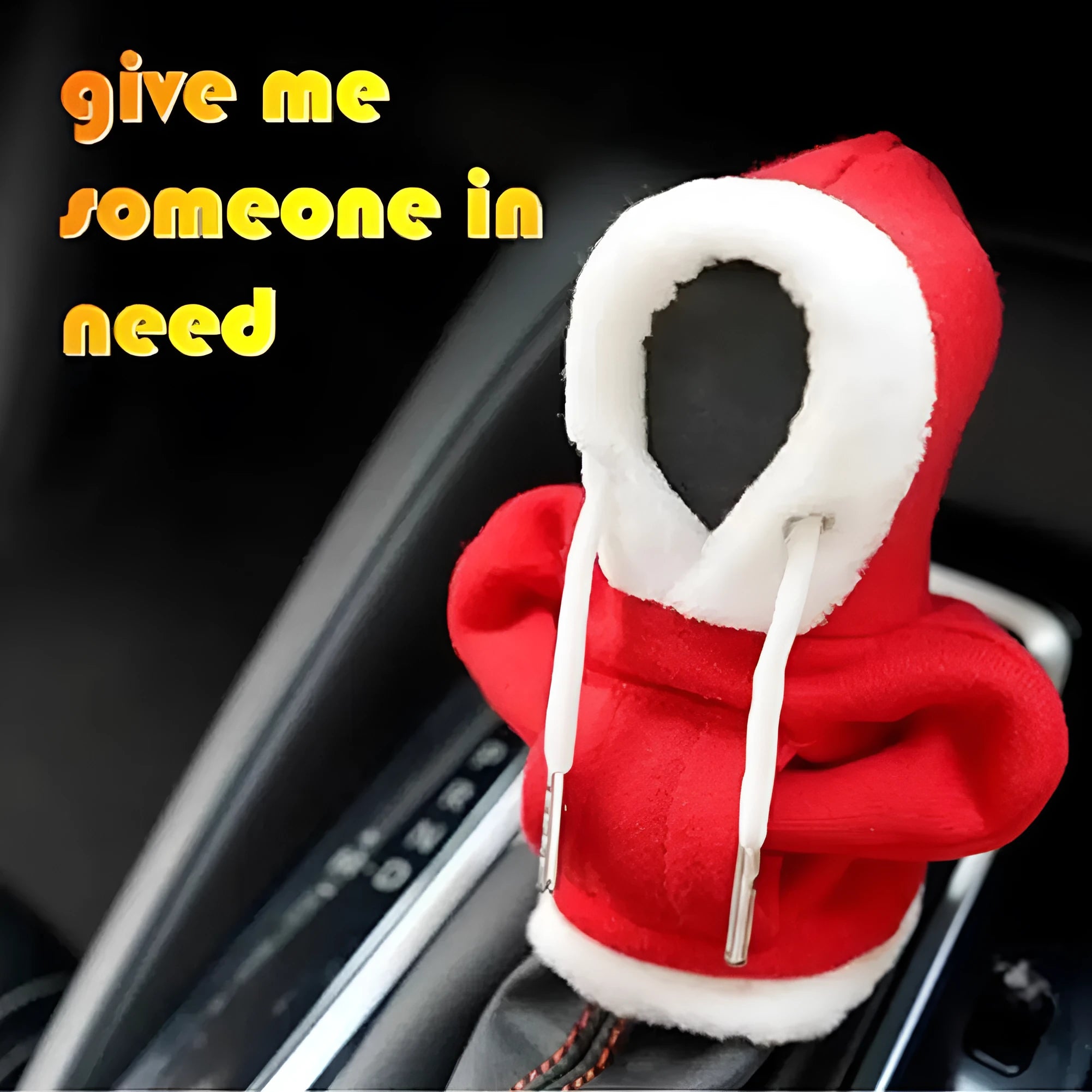 Red and white polyester car gear lever hood cover on a black gear stick.