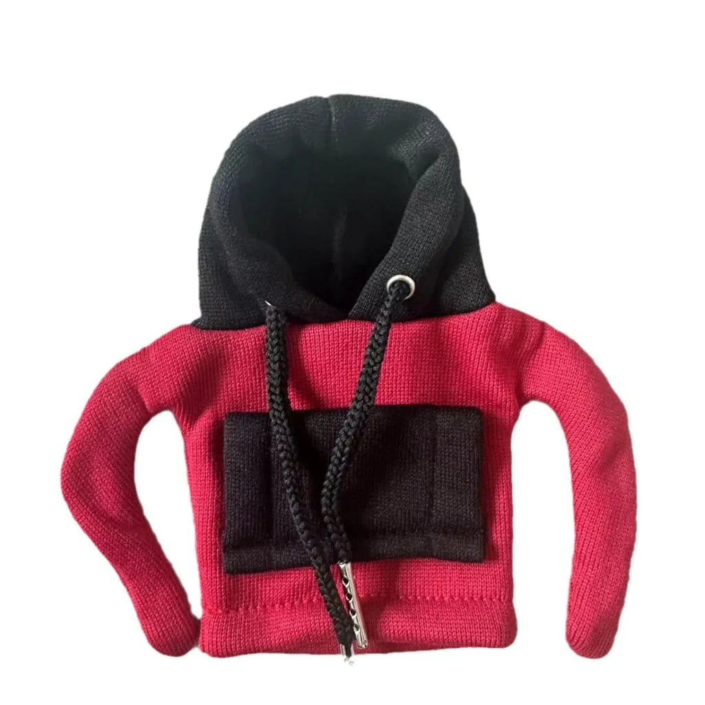 Red and white polyester car gear lever hood cover on a black gear stick.