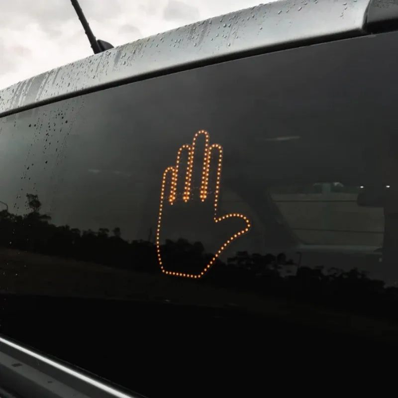 Black plastic LED gesture car light with remote control showing middle finger and other road communication symbols