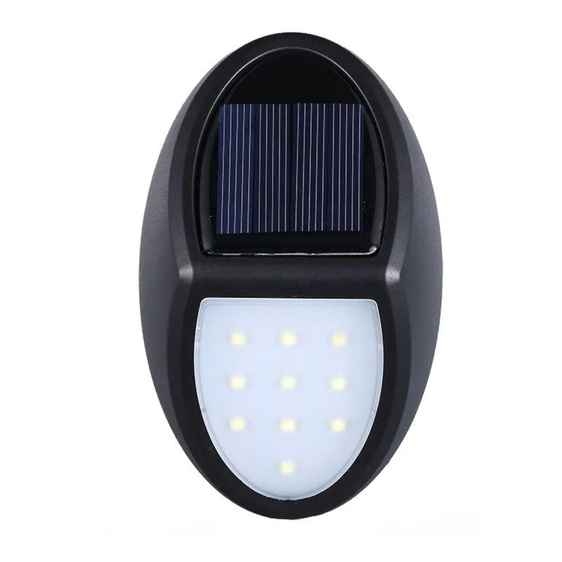 Black rectangular solar wall light with solar panel and LED illumination for outdoor use