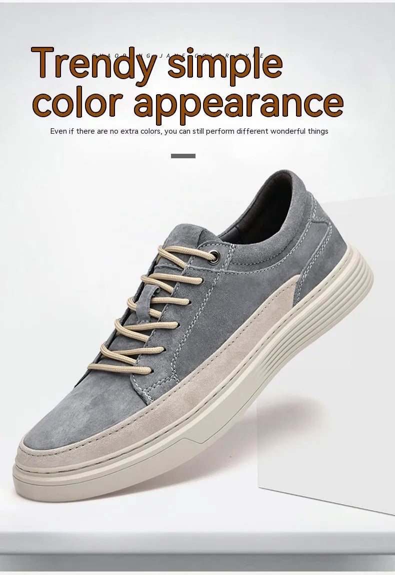 Men's grey casual leather skate shoes with low-top design and round toe on a rubber sole.