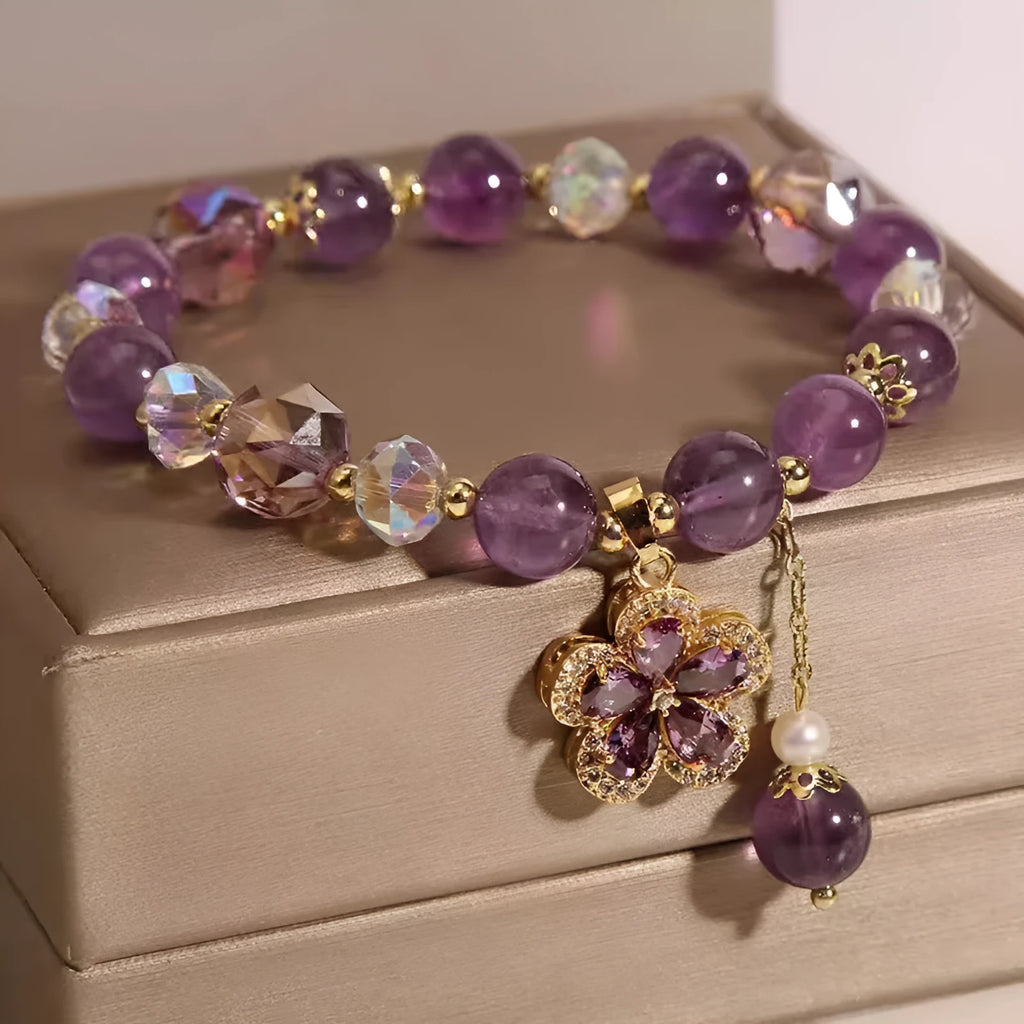 Women's antique-style crystal bracelet with a nine-tailed fox pendant and a separate amethyst floral charm.