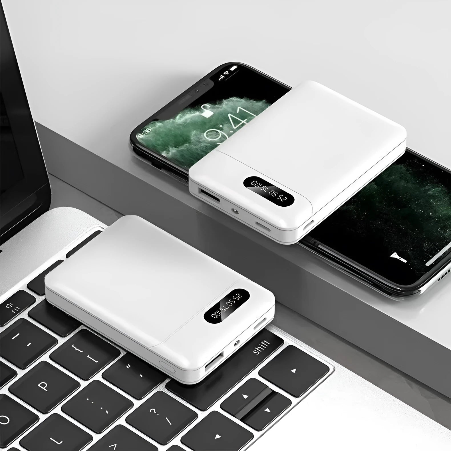 White portable power bank with multiple USB ports showing 10000mAh capacity label