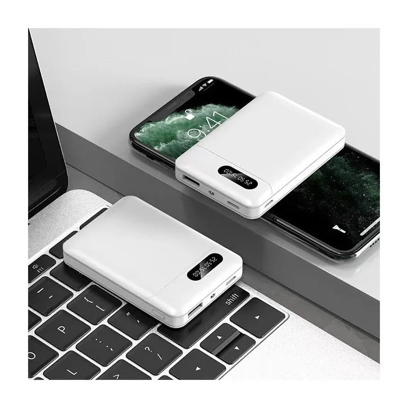 White portable power bank with multiple USB ports showing 10000mAh capacity label