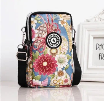 Vertical mobile phone bag in black with Oxford Spinning texture and zipper closure